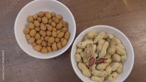 two bowls of peanut and peanut snack 