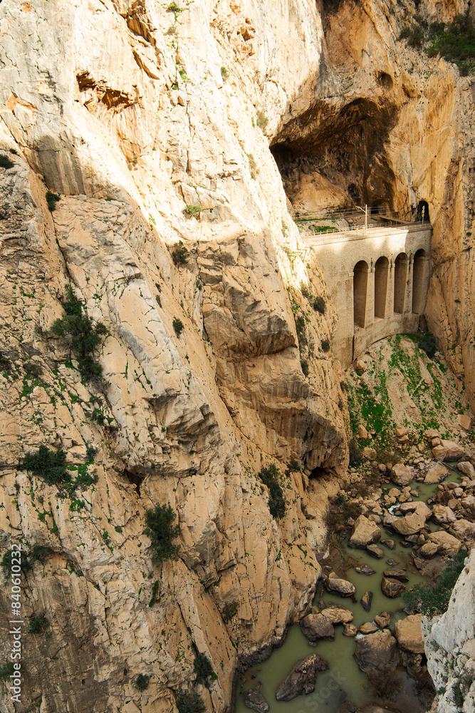 Obraz premium Caminito Del Rey (Royal Trail or The King's Little Path)) is a mountain path along steep cliffs in Gorge Chorro, Andalusia, Spain. Walkway pinned along the steep walls of a narrow gorge.
