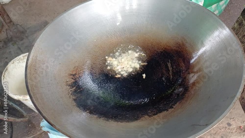 Stir fried kale with crispy pork in oyster sauce. Thai street food called kana moo krob 