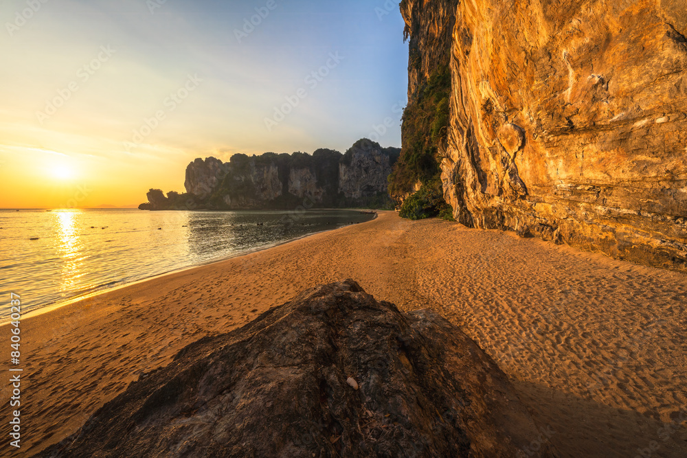 sunset at tonsai beach on tropical island railay in krabi in thailand