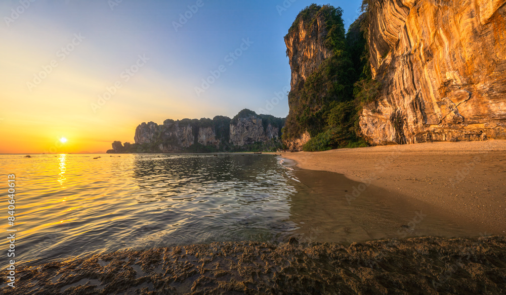 sunset at tonsai beach on tropical island railay in krabi in thailand