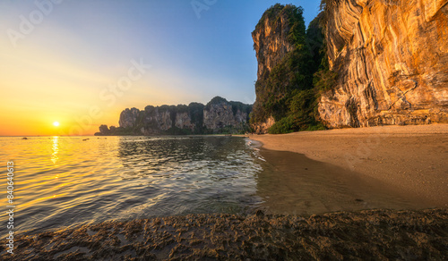 sunset at tonsai beach on tropical island railay in krabi in thailand