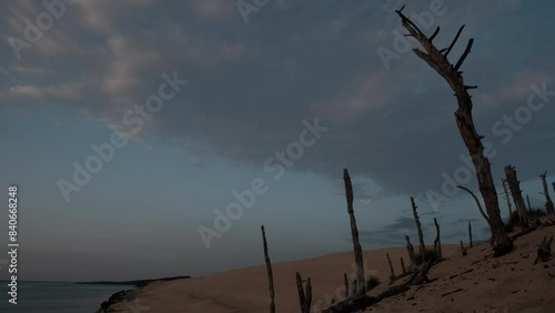 sunset at Dune du Pilat, the highest sand dune in Europe and is located at the Cote d Argent, the silver coast, at the atlantic ocean of France close to Arcachon and cap ferret. photo