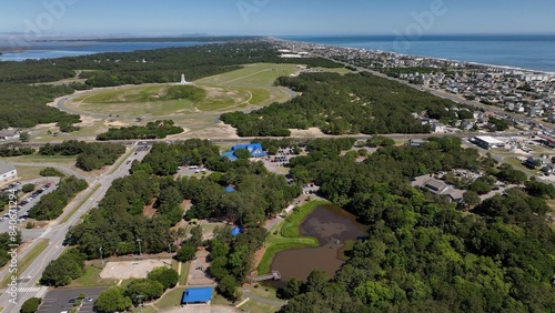 Landscape with Wright Brothers National Memorial to historic first manned airplane flight. Monument located in Kill Devil Hills, North Carolina and open to public photo