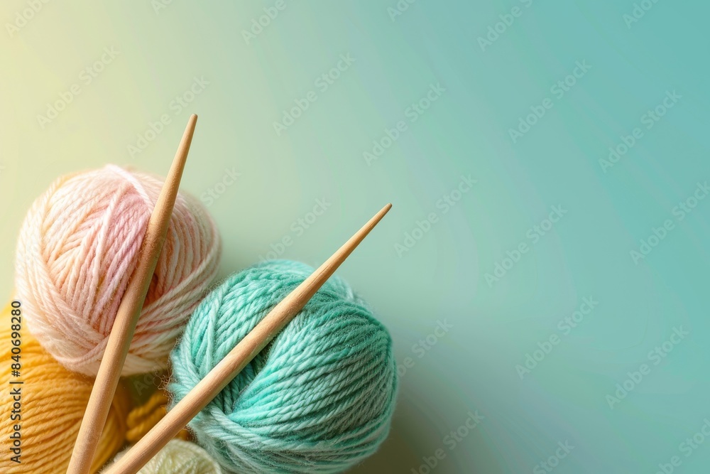 Yarn Balls with Knitting Needles on Gradient Background Yarn Balls with Knitting Needles on Gradient Background