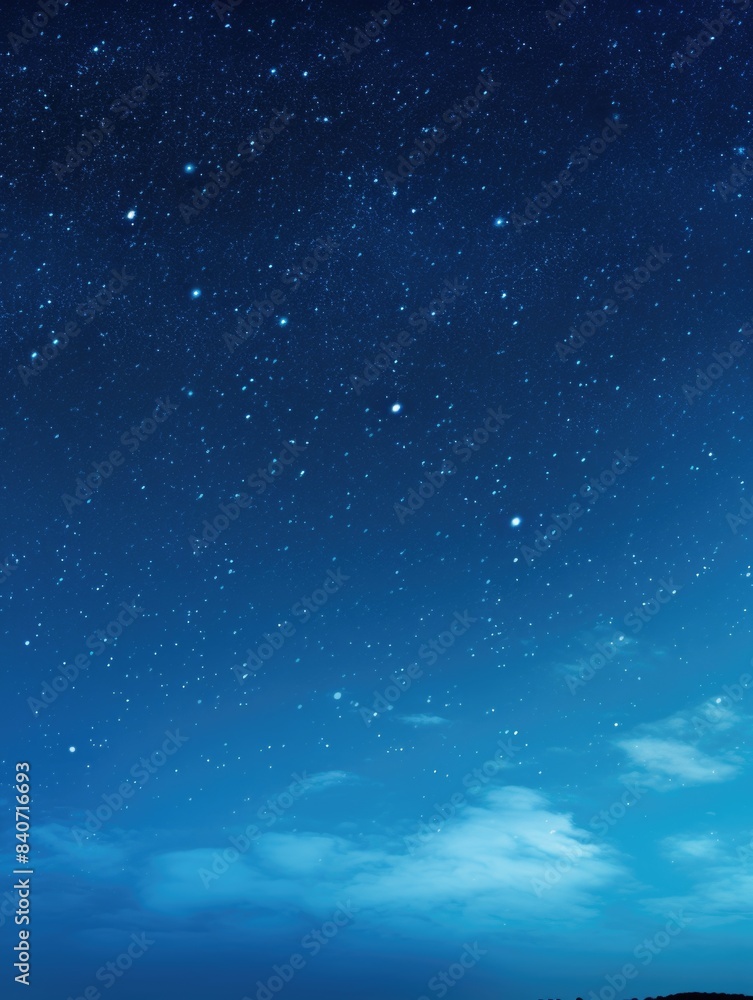 Fototapeta premium A dark blue sky filled with countless stars shining bright, perfect for astronomy or space-themed projects