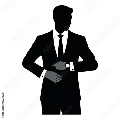 business man in a suit standing and checking time on the wristwatch in a vector silhouette 
