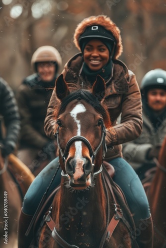 Group of people riding horsebacks, outdoor scene © Fotograf