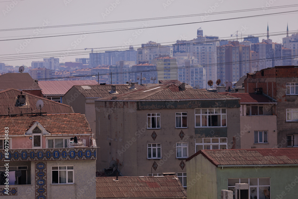 Southern cityscape, view of buildings and houses with green plants in public places in Turkey, sunny summer day in the city of Istanbul Southern cityscape, view of buildings and houses with green plants in public places in Turkey, sunny summer day in the city of Istanbul