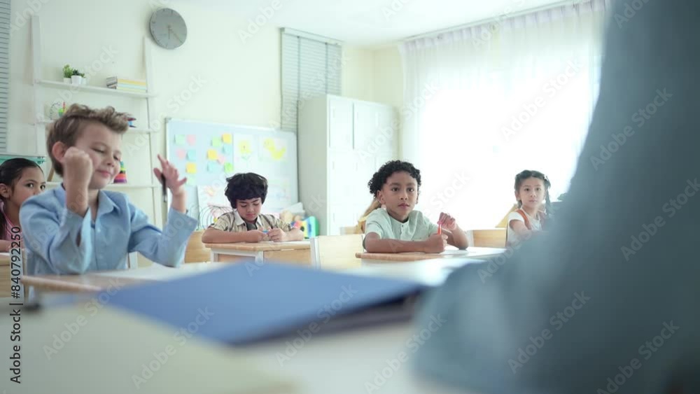 Teacher and students, Learn and study in a classroom of school where youngsters sit and listen attentively. Teacher and students, Learn and study in a classroom of school where youngsters sit and listen attentively.