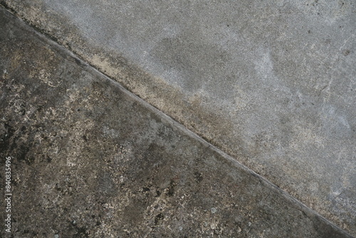 Damaged cement concrete wall texture background, rusty uneven cement wall surface, Grungy abstract wall backdrop