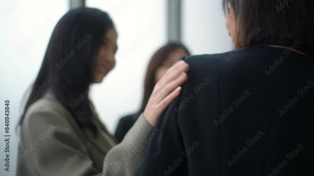 Close-up of young leader asian business woman's hand touching on her team to cheering up, young female leader entrepreneur brainstorming for strategy development with colleague startup partnership.
Close-up of young leader asian business woman's hand touching on her team to cheering up, young female leader entrepreneur brainstorming for strategy development with colleague startup partnership.
