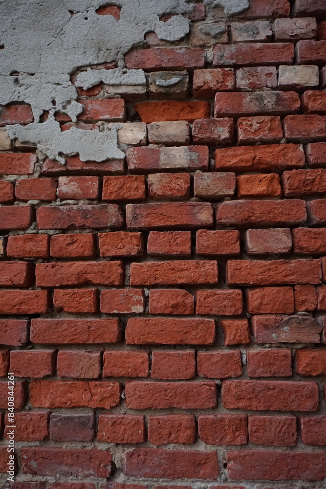 Obraz premium Abandoned rustic brick layered wall surface, Grungy red brick wall texture background, Old rustic colored wall backdrop