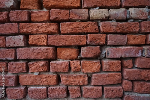 Abandoned rustic brick layered wall surface, Grungy red brick wall texture background, Old rustic colored wall backdrop