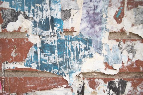 Torn and weathered street poster background, abstract paper collage backdrop