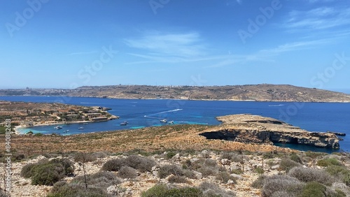 Comino island, Malta, Santa Maria white sand beach and and rugged coast of small island in Malta. High quality photo