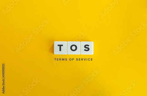 Terms of Service (TOS) Banner. Text on Block Letter Tiles on Flat Background. Minimalist Aesthetics.