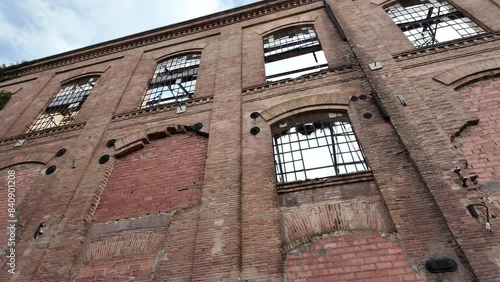 slow motion of large abandoned factory
