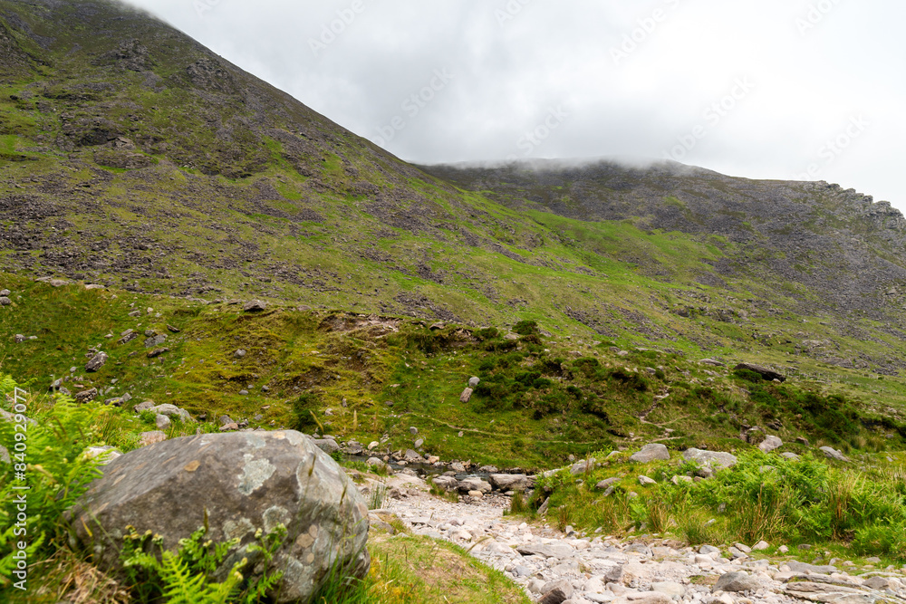 Panoramic view from Devils Ladder, one of most difficult trails, that is leading to highest Irish mountain Carrauntoohill or Carrantuohill is the highest mountain in Ireland at 1038m in Ring of Kerry