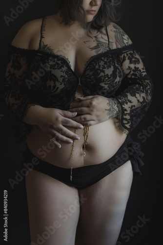 a woman in a black lace bra and panties