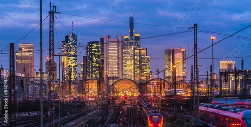 Train and tracks in front of main station and skyline Frankfurt Main in the evening, Gutleutviertel, Frankfurt, Hesse, Germany, Europe
