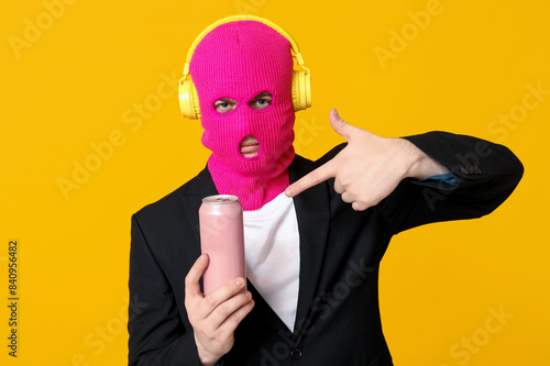 Young man in balaclava with...