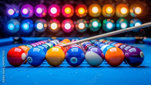 Vibrant neon lit billiard table with pool balls and cue stick under colorful wall lights