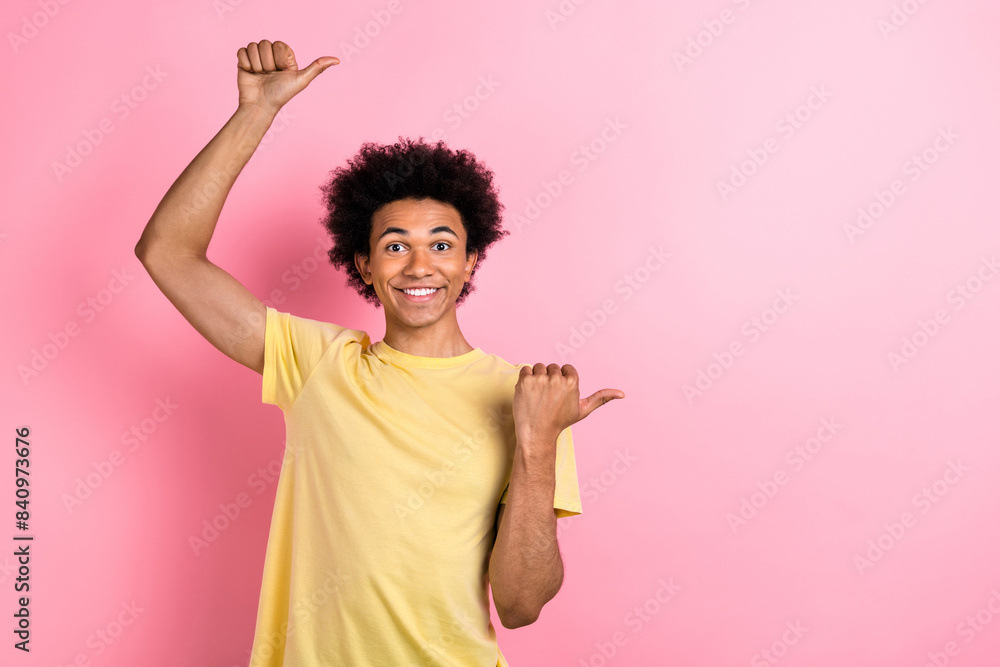Portrait of nice friendly person toothy smile indicate fingers empty space isolated on pink color background Portrait of nice friendly person toothy smile indicate fingers empty space isolated on pink color background