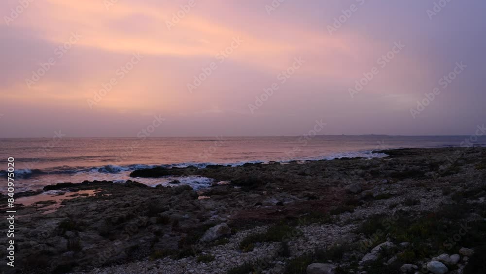 Rocky seashore with sea waves at morning light Rocky seashore with sea waves at morning light