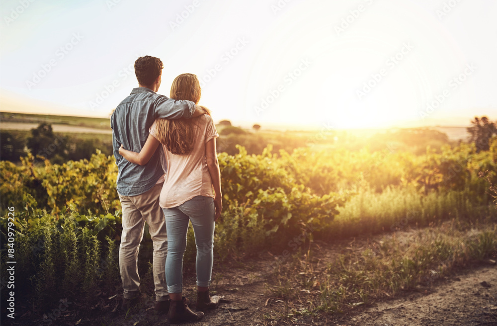 Back, hug and couple in morning, countryside and together in field , love and date for anniversary. Sunrise, partner and person with embrace, nature and peace in grass and relax in Texas in farm Back, hug and couple in morning, countryside and together in field , love and date for anniversary. Sunrise, partner and person with embrace, nature and peace in grass and relax in Texas in farm