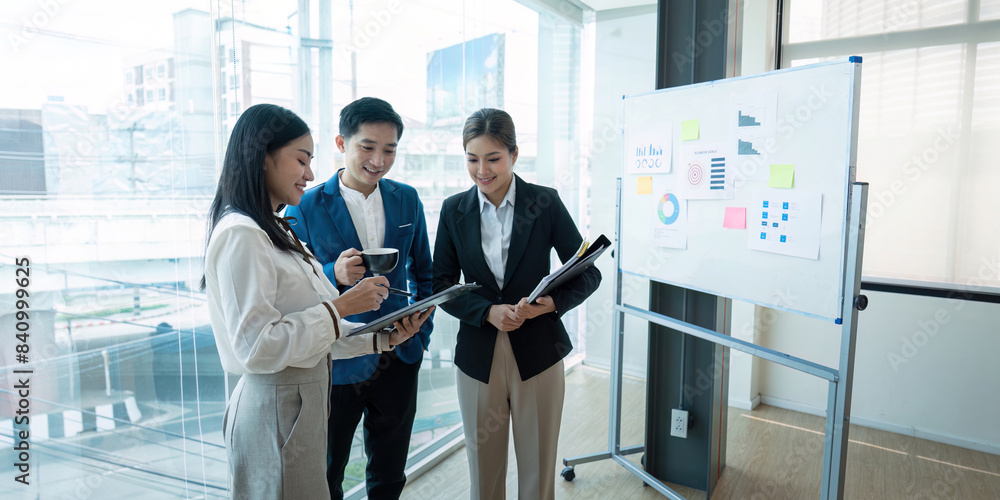 Business team collaborating in modern office, teamwork concept Business team collaborating in modern office, teamwork concept