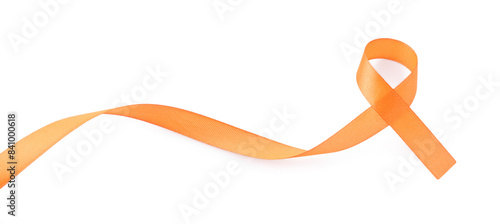 Fotografie Orange awareness ribbon isolated on white, top view