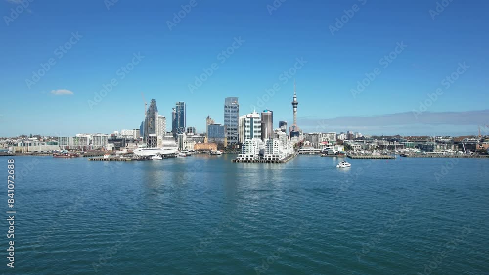Auckland Skyline By The Waterfront On Sunny Day In Auckland, North Island, New Zealand. wide shot Auckland Skyline By The Waterfront On Sunny Day In Auckland, North Island, New Zealand. wide shot