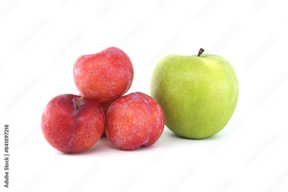 Red plums and green apple isolated on white background Red plums and green apple isolated on white background