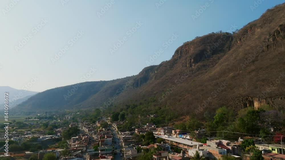 Tamazula de Gordiano, Jalisco, Mexico - A Panoramic Vista of Mountain Foothill Communities - Drone Flying Forward