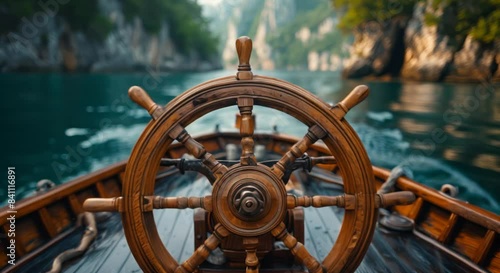 A captain's wheel with a blurred sea horizon, symbolizing steering and direction