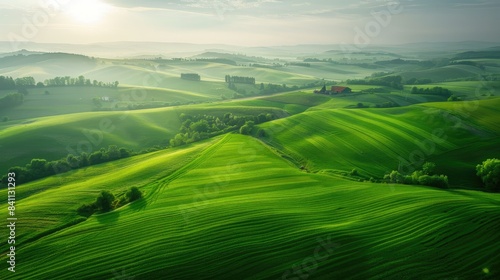 landscape with green fields and agricultural farm land of natural 