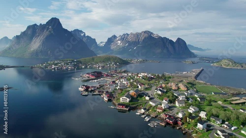 Spring in Reine: Colorful Mountains and Cottages from Drone in the Lofoten Islands, Norway. photo
