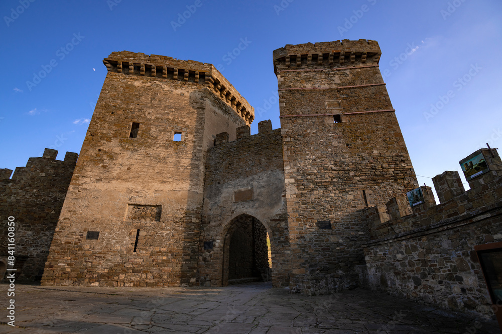 Towers of the internal gates of the ancient Genoese fortress on a May evening, Sudak Towers of the internal gates of the ancient Genoese fortress on a May evening, Sudak