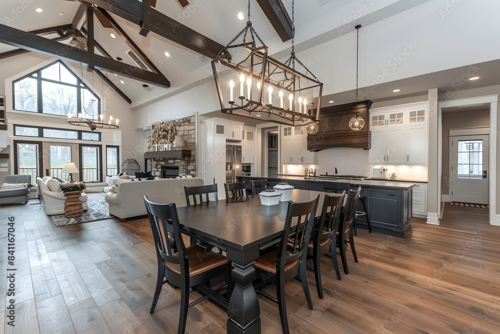 an open concept kitchen and dining room in a luxury home, in the modern farmhouse style with white cabinets an open concept kitchen and dining room in a luxury home, in the modern farmhouse style with white cabinets