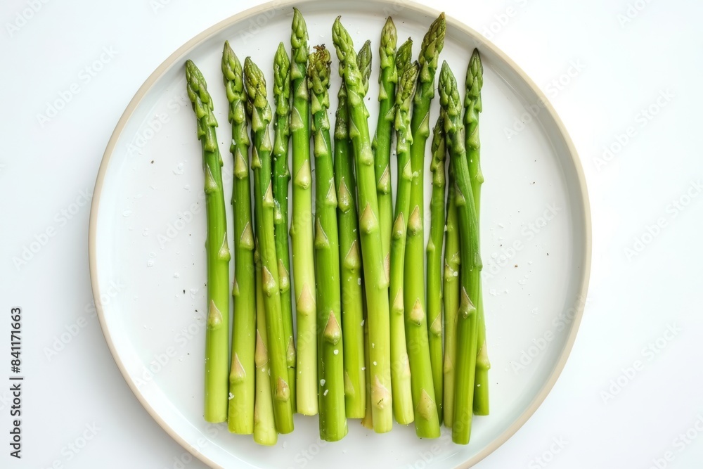 Vibrant Green Asparagus Spears with Salt, Lemon, and Pepper Vibrant Green Asparagus Spears with Salt, Lemon, and Pepper