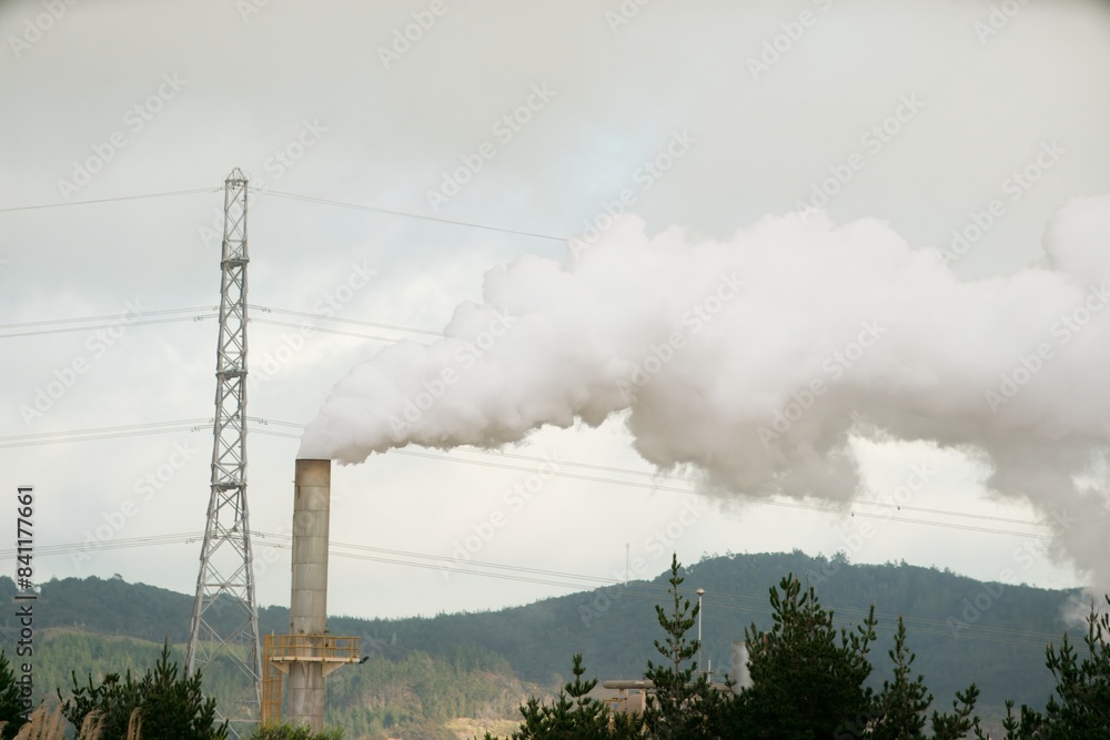 Rural Power Pole and Smoking Chimney: Industrial Impact on Countryside Air Quality and Environment Rural Power Pole and Smoking Chimney: Industrial Impact on Countryside Air Quality and Environment