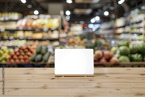 Blank board with blurred supermarket background, retail and advertising © Emanuel