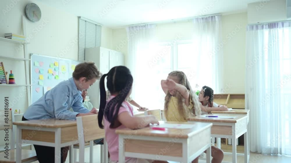Students learn and study in a classroom of school where youngsters sit and play. Students learn and study in a classroom of school where youngsters sit and play.