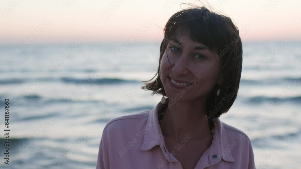 Summer mood. girl on the beach. happy young girl in a pink shirt and swimsuit resting on the beach. Happy woman. the girl is standing on the beach. relaxation on the beach.
Summer mood. girl on the beach. happy young girl in a pink shirt and swimsuit resting on the beach. Happy woman. the girl is standing on the beach. relaxation on the beach.