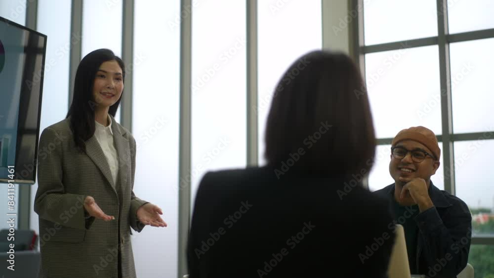 Asian business leader woman on meeting and planning project strategy with diverse colleague, entrepreneur with startup partnership member provide sharing ideas with team in office room. Asian business leader woman on meeting and planning project strategy with diverse colleague, entrepreneur with startup partnership member provide sharing ideas with team in office room.