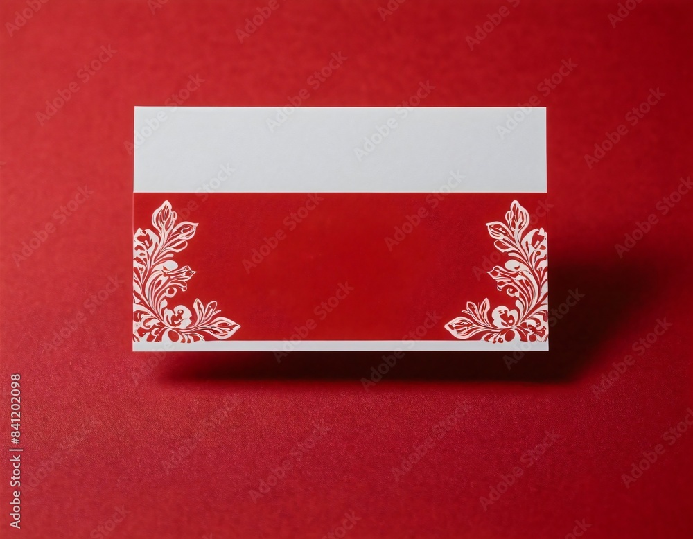 Elegant blank business card on red backdrop Elegant blank business card on red backdrop