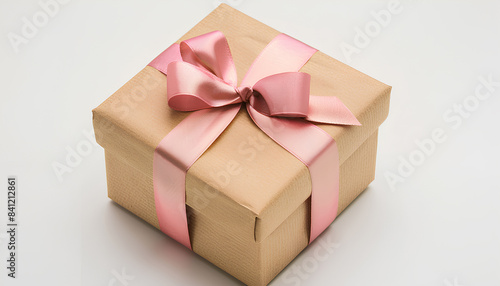 Gift box tied with satin ribbon isolated on white background