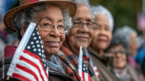 Obraz na płótnie A group of seniors holding American flags at a vet 67 1 senior, couple, elderly, old, woman, people, smiling, grandfather, person, retired, mature, outdoors, retirement, love, smile, happiness, older, w salonie