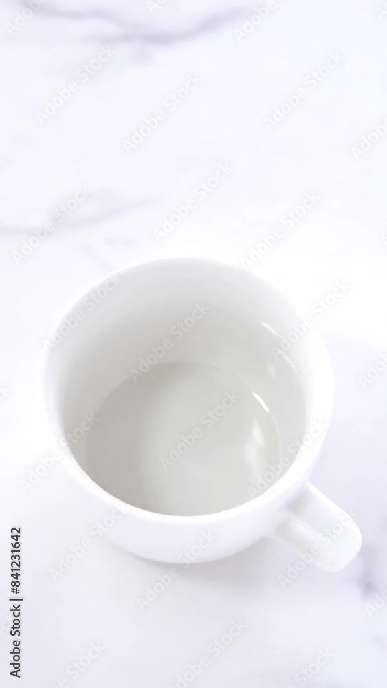 Pouring fresh and delicious coffee into coffee cup
Pouring fresh and delicious coffee into coffee cup